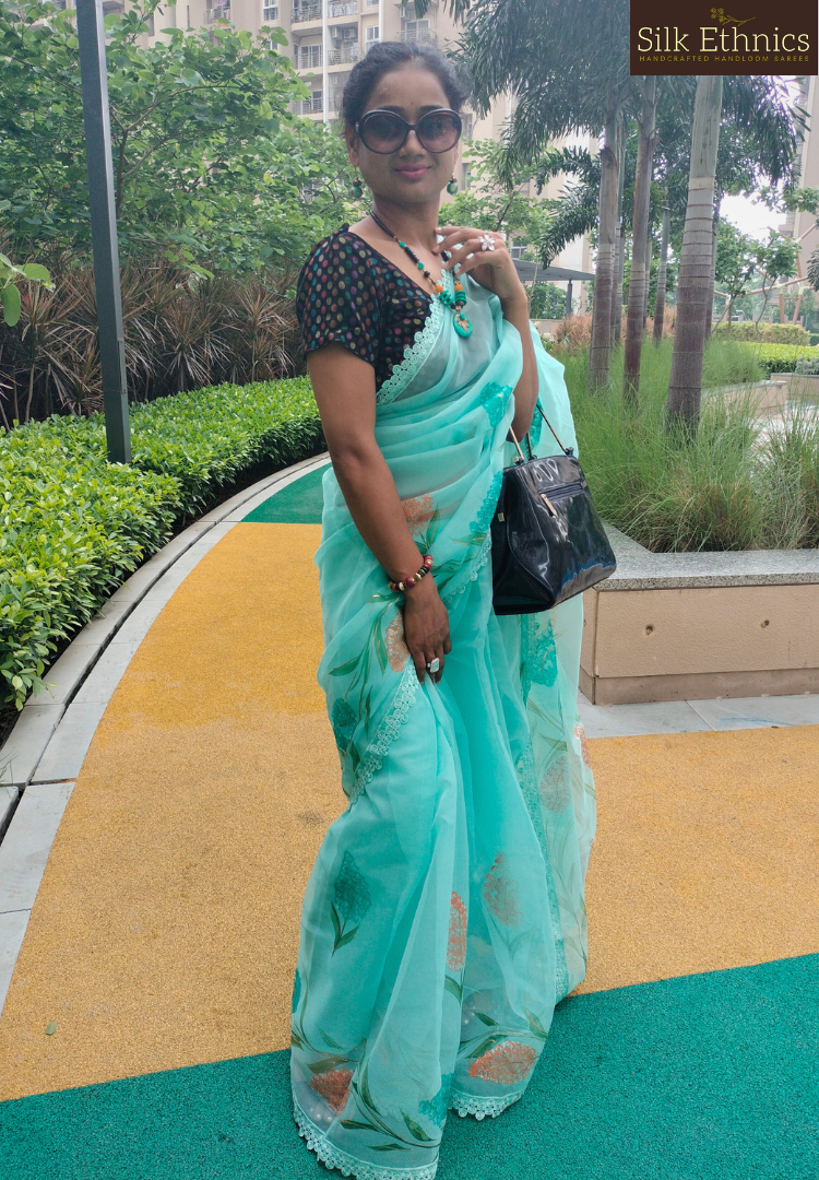 Handpainted turquoise Blue soft organza  saree