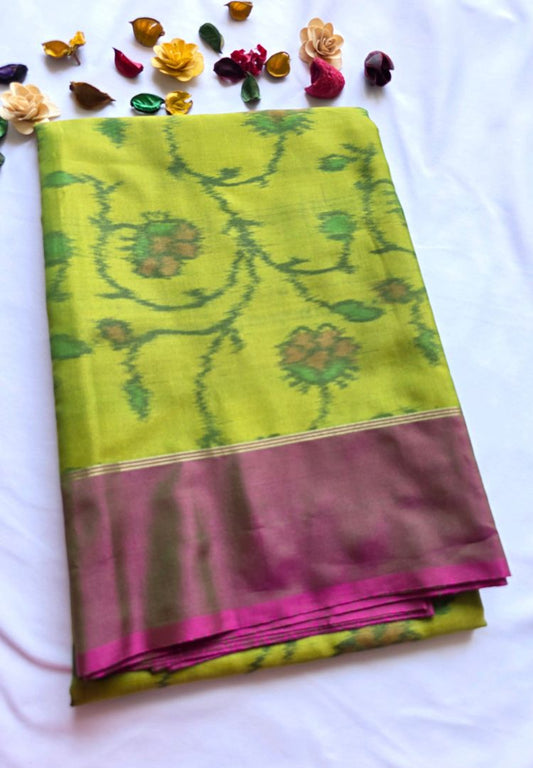 Folded parrot green semi katan silk saree with Ikkat floral jaal and wine border