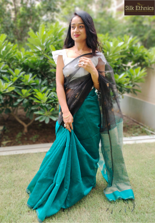 Peacock green half matka muslin saree