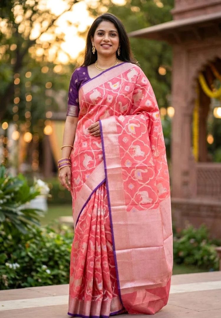 Woman wearing the Rose Pink Pichwai zari weaving Kota silk saree - Silk Ethnics