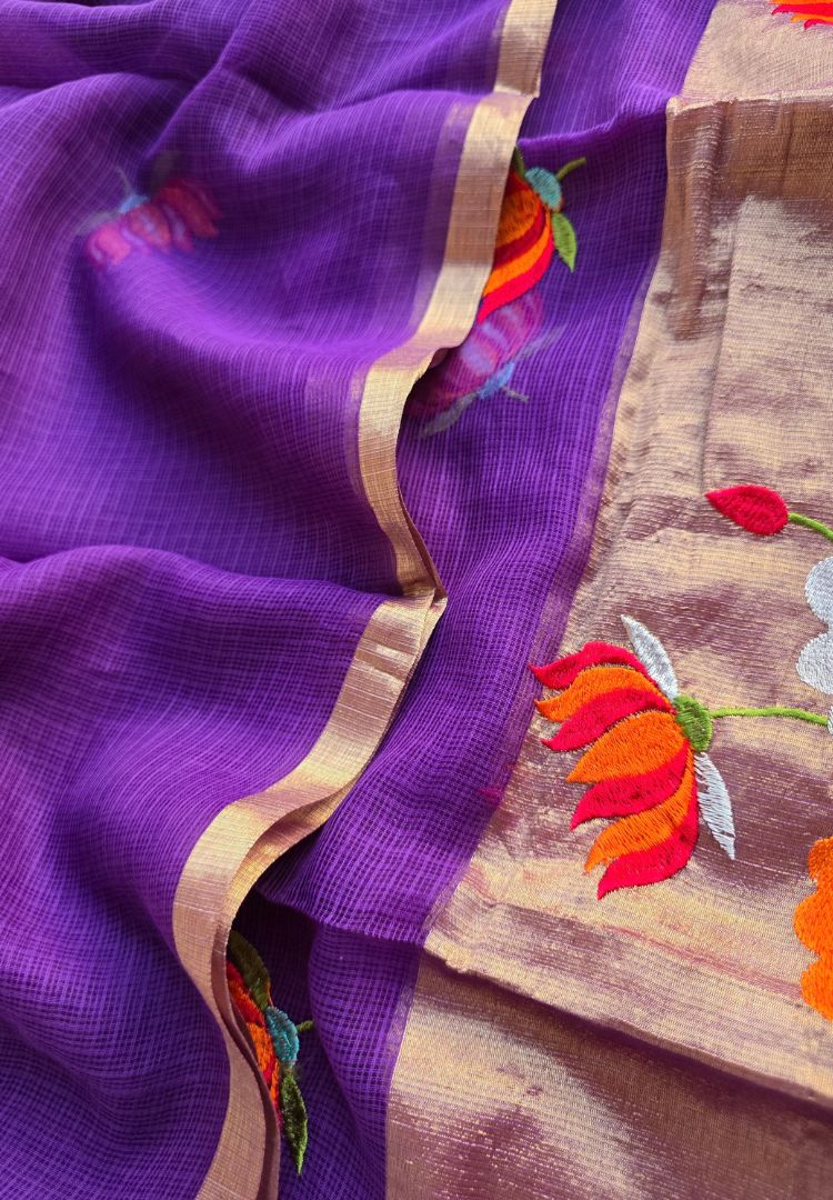 Lavender Kota saree with gold zari pallu embroidered with swans and lotus
