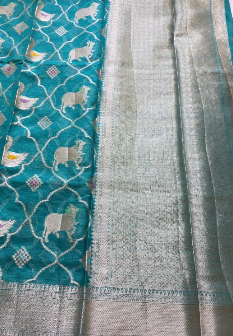 Teal Kota silk body and zari pallu of the Pichwai saree