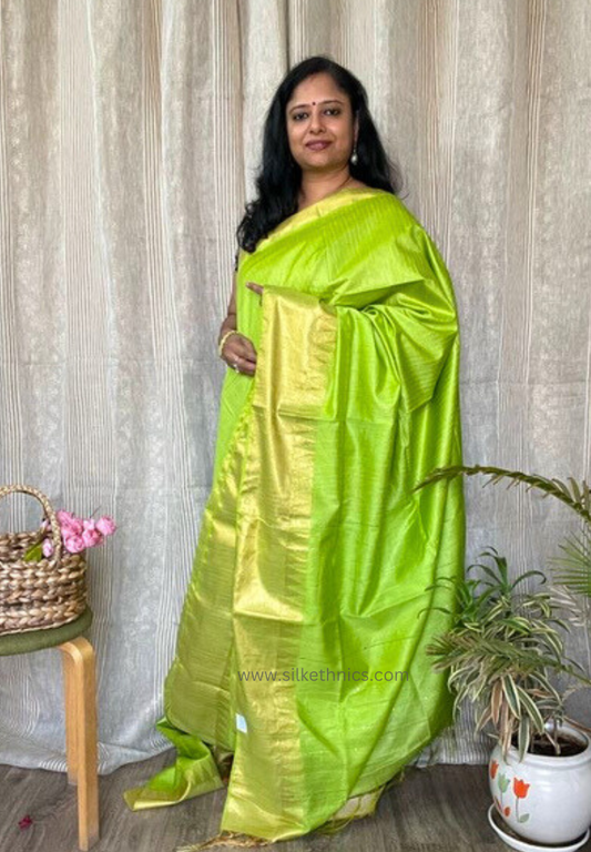 Temple border green raw silk saree