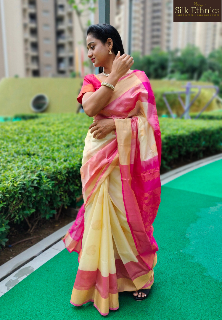 Pearl white and pink Paarijatam silk saree