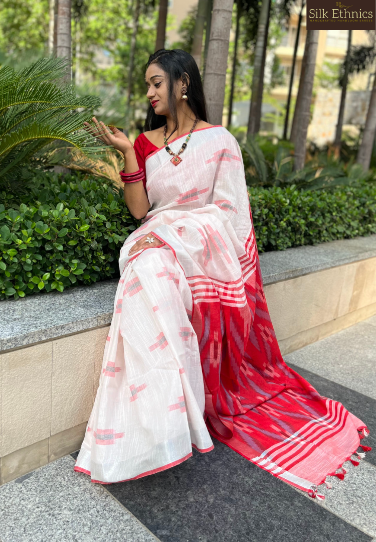 White and red linen ikkat weaving saree