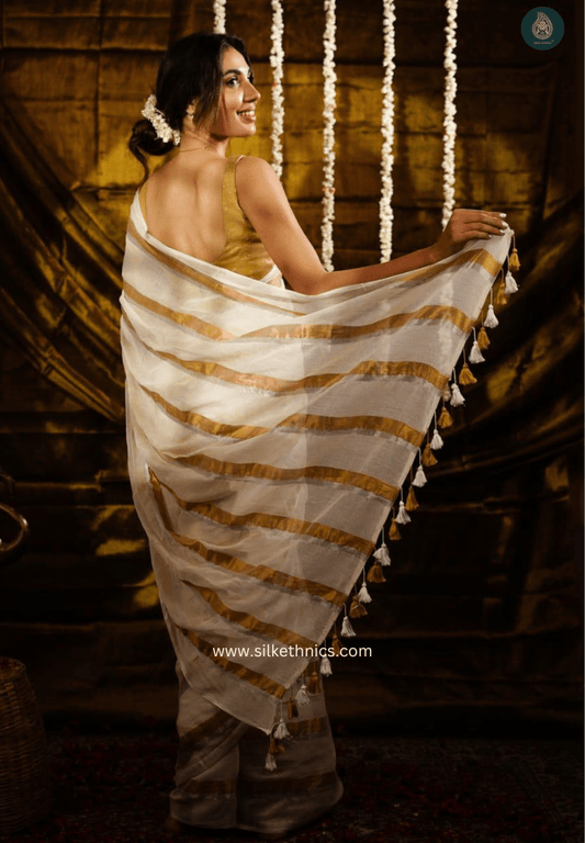 Zari striped White Rangreet mulcotton saree